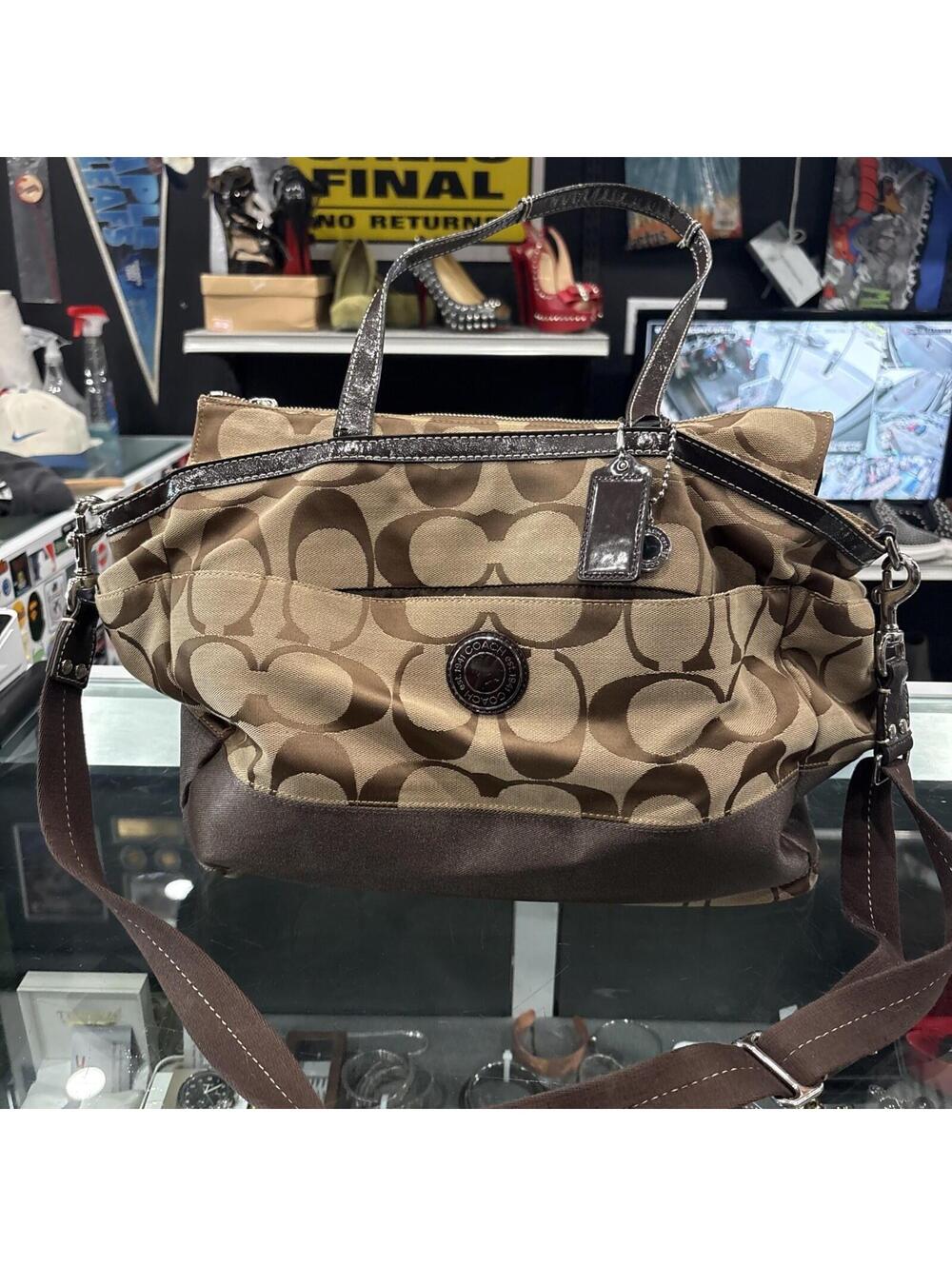 Woman’s Coach Signature Strap Multi-pocket Tote - Brown